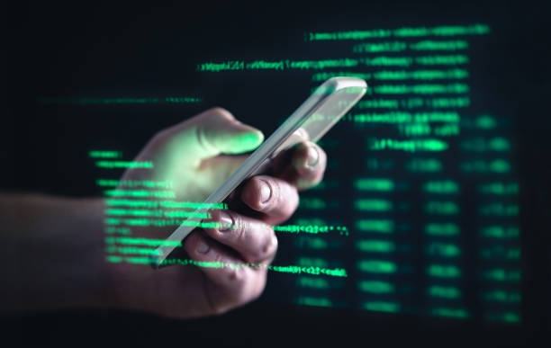 smartphone displaying hacking code representing whatsapp security threat